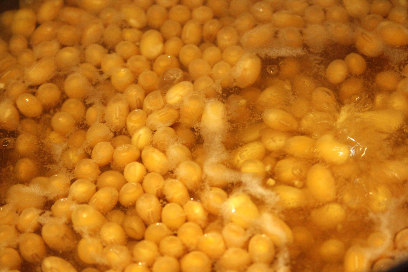 Cooking facilitates and accelerates the removal of the hulls